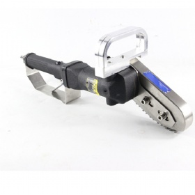 Pneumatic tool for stripping and trimming cardboard waste.